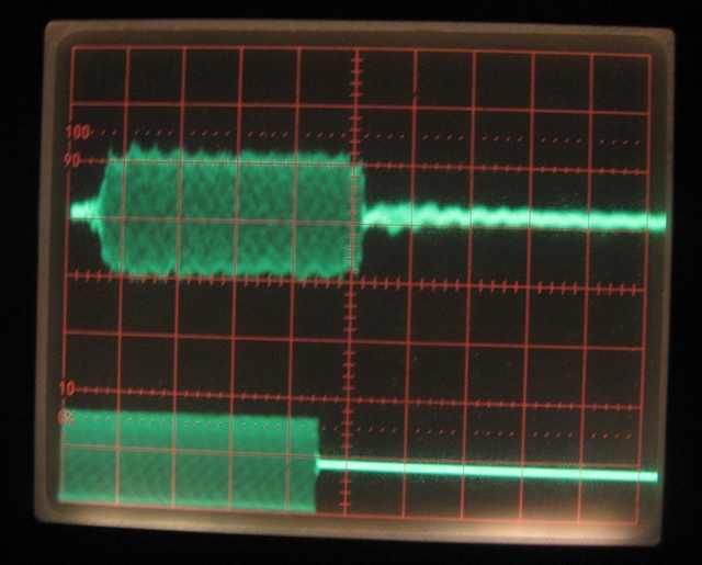 Oscillogram displaying tone pulse propagation delay of 600 us